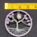 tree of life is shown as measured by a ruler to be 3 inches